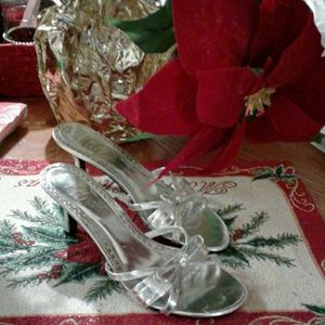 $15.Silver Shoes with a bow....